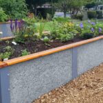 Cuál es el mejor método para pintar una cama elevada de jardín