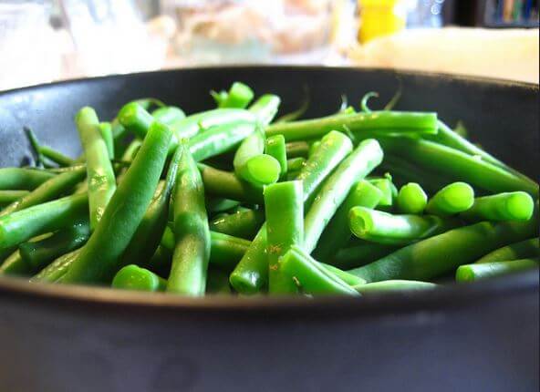 Cuál es la historia de los frijoles verdes en la gastronomía