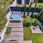 Cuál es la mejor forma de plantar alrededor de un jacuzzi